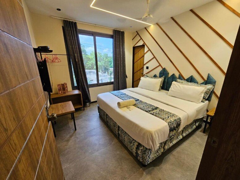 Hotel Nova Palm bedroom rajkot